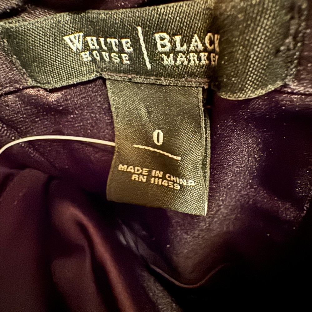 White House Black Market dress, never worn.  Strapless black fits well!